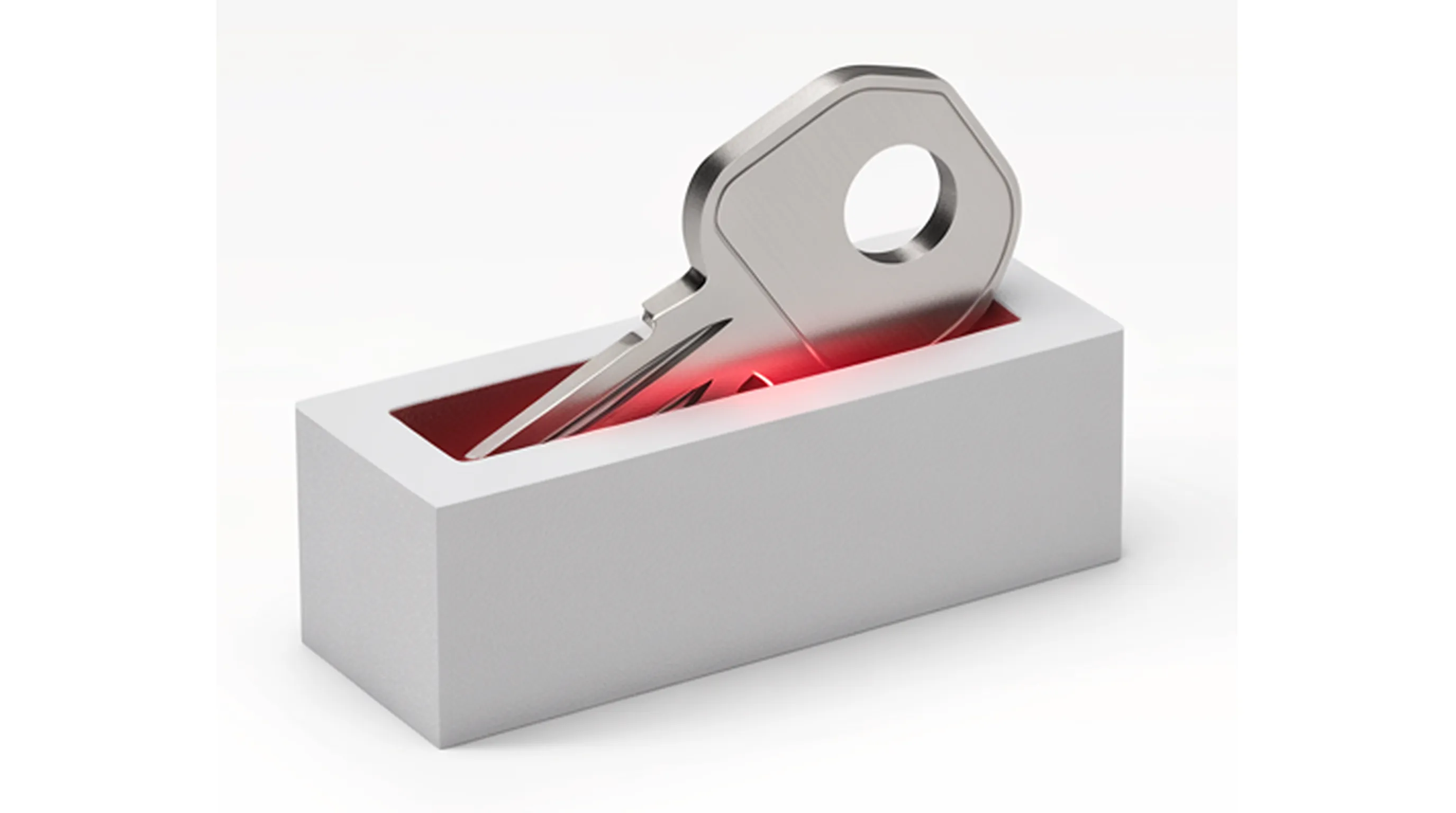A machined white authorisation key partly seated in a matching keyway, the keyway's edge lit red.