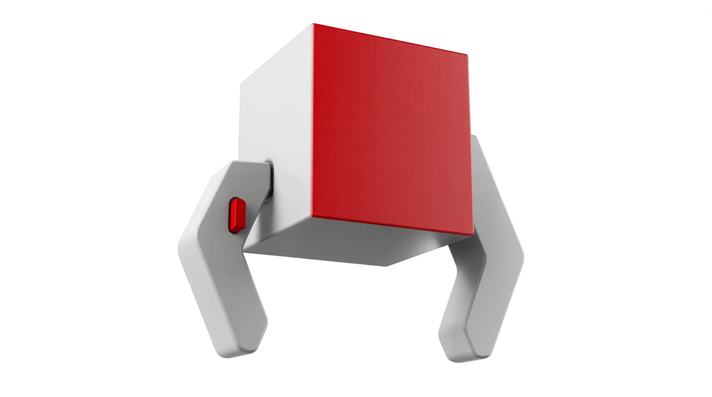 A light grey machined robotic gripper holding a small cube, one face of the cube anodised red.