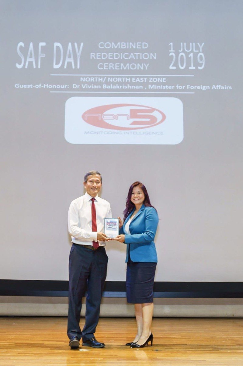 Presentation at the SAF Day Combined Rededication Ceremony, 1 July 2019, in front of the ceremony backdrop.